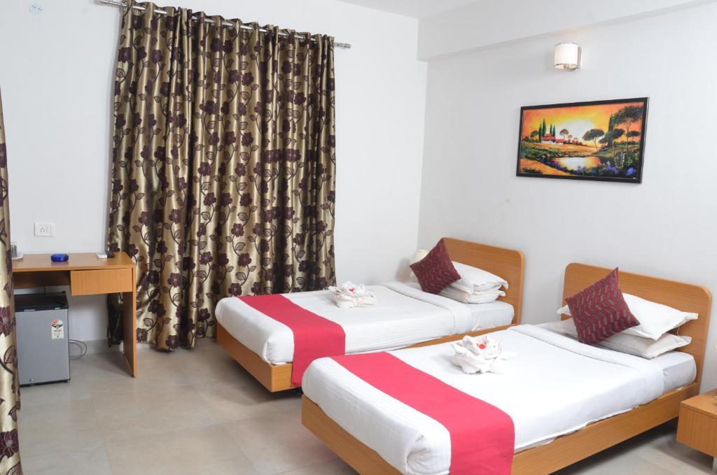 Sunkissed Plaza Hotel Калангуте Стая снимка